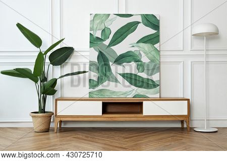 Picture frame on a cabinet with Scandinavian home interior