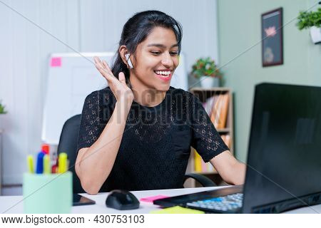 Happy Smiling Young Corporate Girl Employee On Meetig During Online Client Meeting On Laptop From Ho
