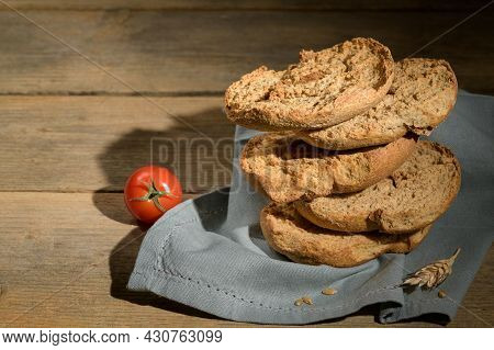 Tipical Summer Dish Of Puglia - Friselle. Classical Apulian Dried Bread Called Freselle. Healthy Veg