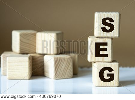 Seg (standardization Evaluation Group) - Acronym Nadrevyannye Cubes On A Brown Background