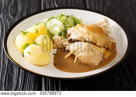 Grydestegt Kylling Danish Pot-roasted Chicken With Potatoes, Cucumber Salad, And Sauce Closeup In Th