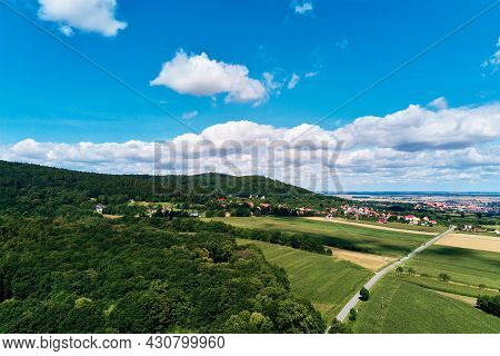 Aerial View Of Beautiful Landscape In Mountains With Forest And Fields. Sleza Mountain Near Wroclaw 