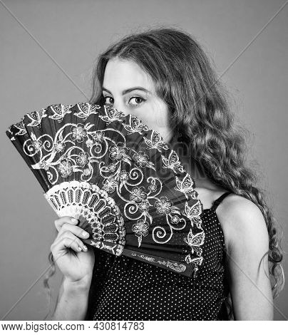 Summer Heat. Fresh Air. Kid Girl Fanning Herself With Fan. Air Circulation. Mysterious Vintage Girl.
