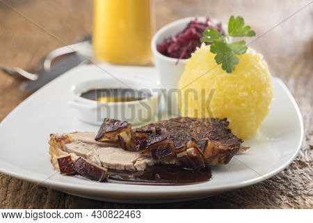 Closeup Of Bavarian Roasted Pork With Potato Dumpling