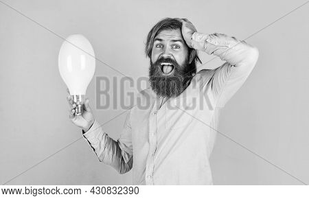 Oh My God. Innovation. Happy Bearded Man Holding Lamp Bulb. Creative Idea. Inspired With New Idea. M