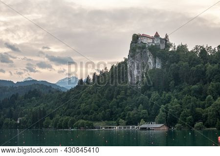 Selective Blur On The Bled Castle, Also Called Blejski Hrad, During Summer, At Sunset, By The Mounta