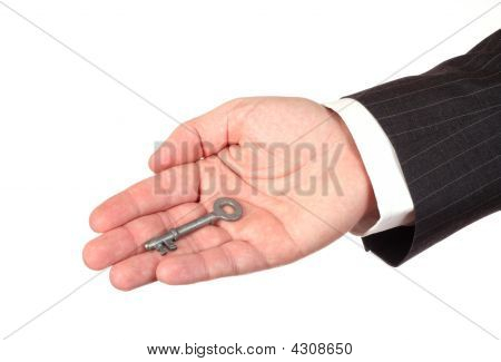 Hand mit Schlüssel