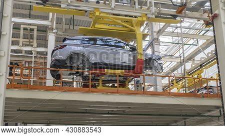 Car Production Line. Assembling Cars At Conveyor Assembly Line. Modern Assembly Of Cars At The Plant