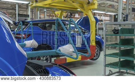 Car Production Line. Assembling Cars At Conveyor Assembly Line. Modern Assembly Of Cars At The Plant