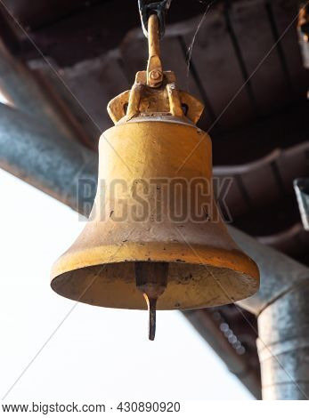 Copper Old Vintage Bell. Decor Concept Element In The Interior Of A Deck, Cabin Of A Ship, Restauran