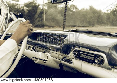 Varadero, Cuba - May 20, 2021: Convertible, Dashboard Of A Retro Car. Hand On The Wheel