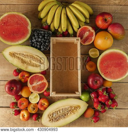 Fresh Fruits On Wooden Background With Copy Space, Colorful Fruits. Food Concept. Copy Space

Fresh 