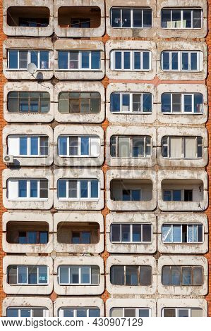 Full Frame Background And Texture Of Typical Mid-russian Concrete And Brick High Rise Condominium Re