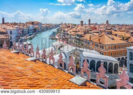 Rialto Bridge Above Grand Canal. View From Rooftop Lookout Terrace Of The Fondaco Dei Tedeschi. Veni