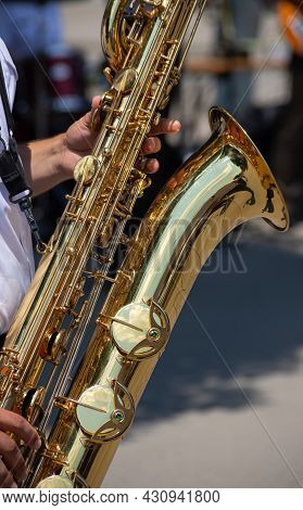 Playing A Brass Instrument. Military Band Performs At The Festival