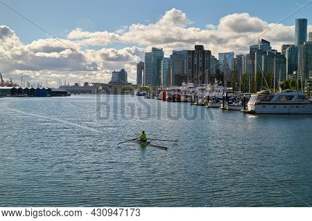 Vancouver, British Columbia, Canada - July 2, 2018. Coal Harbor Rower Stanley Park. A Rower In Coal 