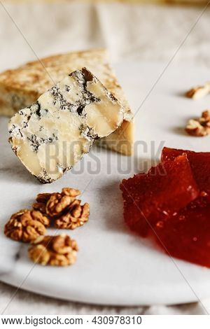 Slice Of Blue Aged Stilton Cheese Accompanied With Quince Marmalade Or Jelly Or Jam Spanish Dulce De
