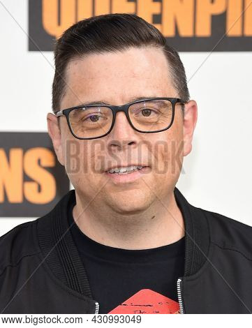 LOS ANGELES - AUG 25: Aron Gaudet poses at the ÃQueenpinsÃ photocall on August 25, 2021 in Beverly Hills, CA