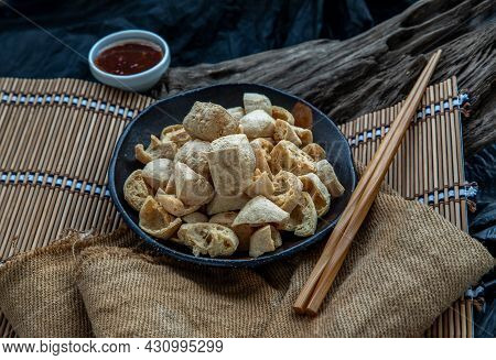 Deep Fried Crispy Tofu Or Fried Bean Curd Served With Sweet And Sour Spicy Sauce. Selective Focus.