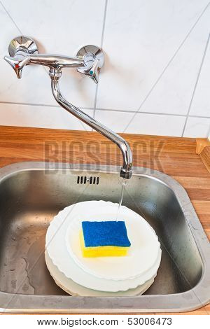 Washing-up By Cleaning Sponge