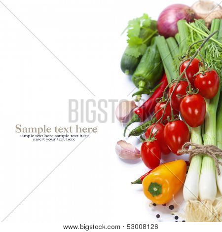 fresh vegetables on the white background - healthy or vegetarian eating concept (with easy removable sample text)