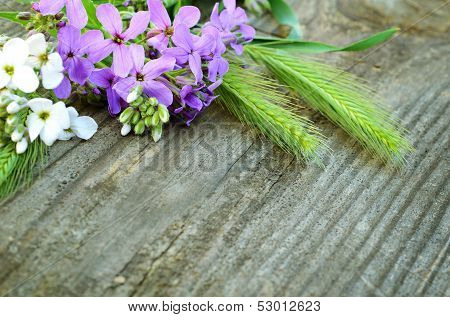 Wildflowers on wood