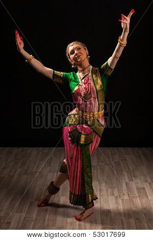 Young beautiful woman dancer exponent of Indian classical dance Bharatanatyam