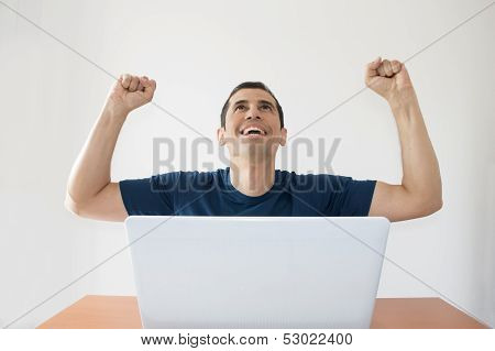 Celebrating With Arms Raised