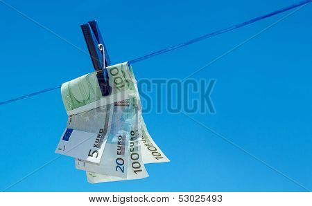 Euro Money Banknotes Hanging On Clothesline