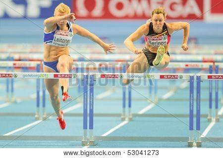 GOTHENBURG, SWEDEN - MARCH 1 Eline Berings (Belgium) places 3rd in heat 1 of the women's 60m hurdles event during the European Athletics Indoor Championship on March 1, 2013 in Gothenburg, Sweden.