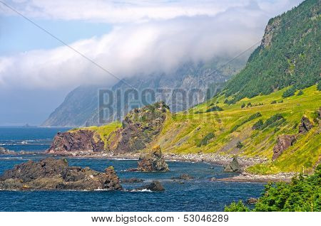 Clouds And Crags Along An Ocean Coast
