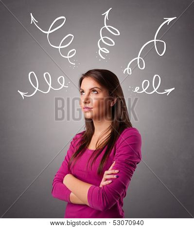 Beautiful young woman thinking with arrows overhead