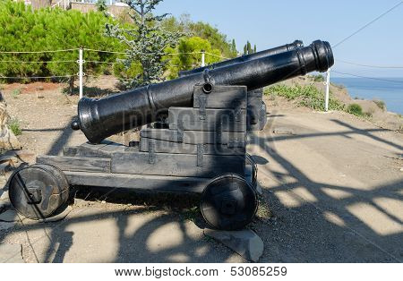 Old Cannons Near The Temple-beacon In Malorechenskoye. Crimea.