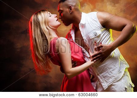 Young couple dances Caribbean Salsa