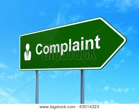 Law concept: Complaint and Business Man on road sign background