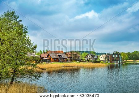 Houses On Embankment Of Lake
