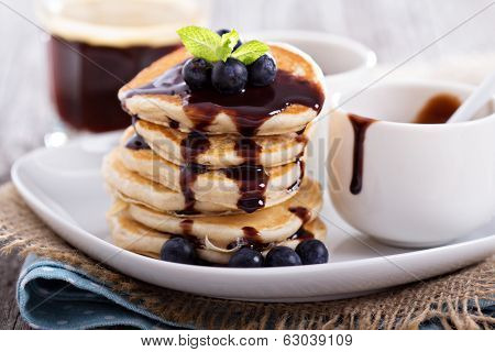 Eggless pancakes with blueberries and chocolate