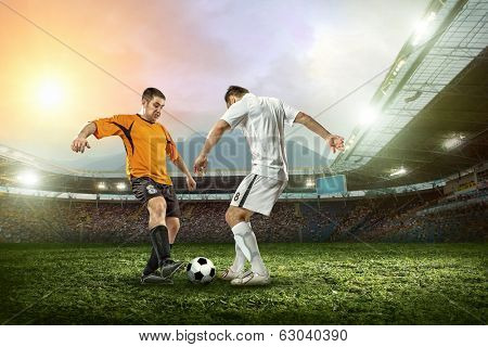 Soccer player with ball in action outdoors.