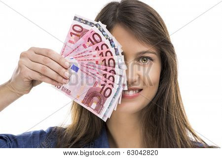 Beauitful woman holding some Euro currency notes, isolated over white background