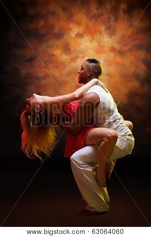 Young couple dances Caribbean Salsa