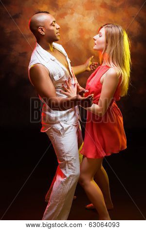 Young couple dances Caribbean Salsa
