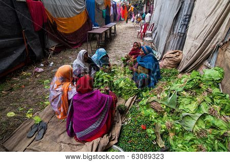 Rural Indian Women Cutting Vegetables