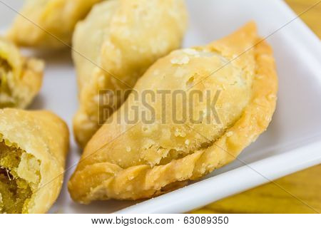 Curry Puffs On White Plate