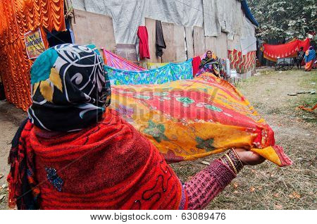 Rural Indian Women Drying Sari