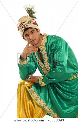 Young indian male in dhoti dress, isolated on white background