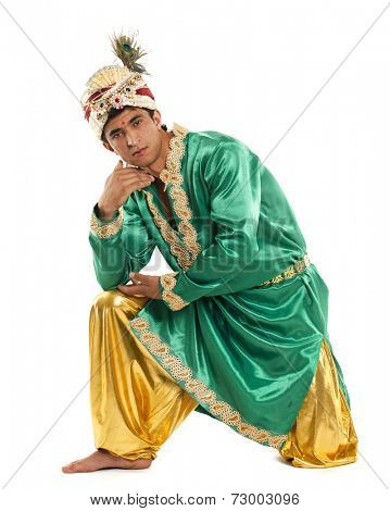 Young indian male in dhoti dress, isolated on white background
