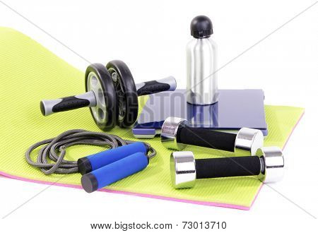 Sport requisites on a carpet isolated on white