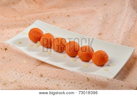 A row of laddoos - An indian sweet