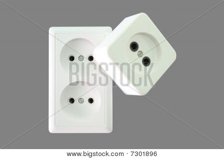 Electrical sockets on a grey background