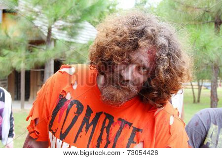 MUSKOGEE, OK - Sept. 13: Bloody zombies wait for runners to attack during the Castle Zombie Run at the Castle of Muskogee in Muskogee, OK on September 13, 2014. 
